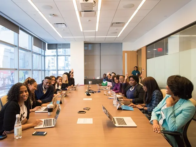 A boardroom full of people